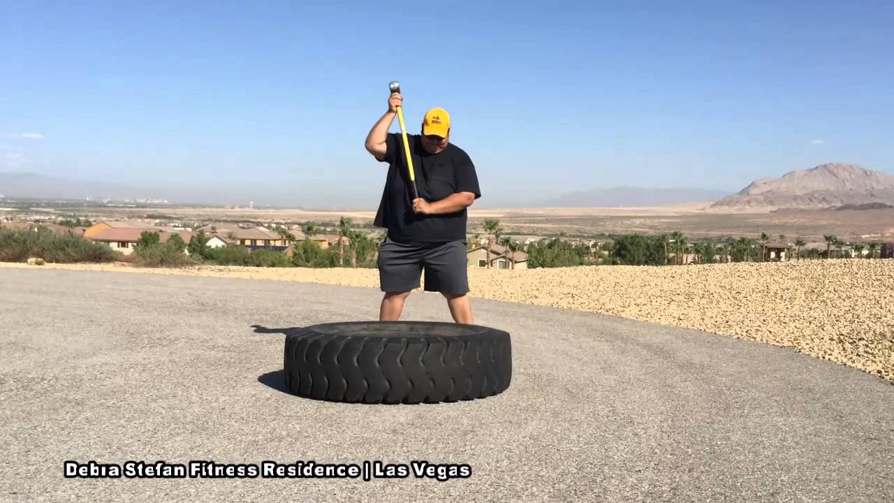 James performing tire training at a Las Vegas weight loss retreat after losing 42 pounds and 7 inches from his waist in four weeks.