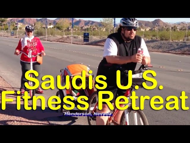 Adult participants biking on a Nevada desert trail during an outdoor fitness for weight loss program