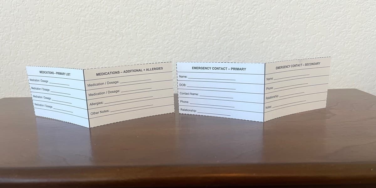 Printable emergency contact medication cards folded for a wallet